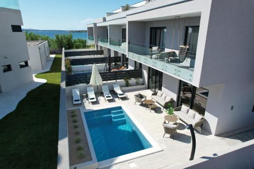 Beachfront Villa Taris with Seaview — 4-Star Luxury Hotel in Privlaka, Croatia