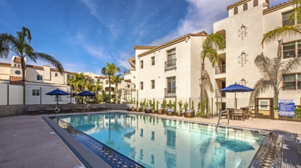 Global Luxury Suites at Tiverton Ave - featured photo