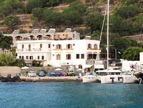 Three Brothers in Mandraki, Greece