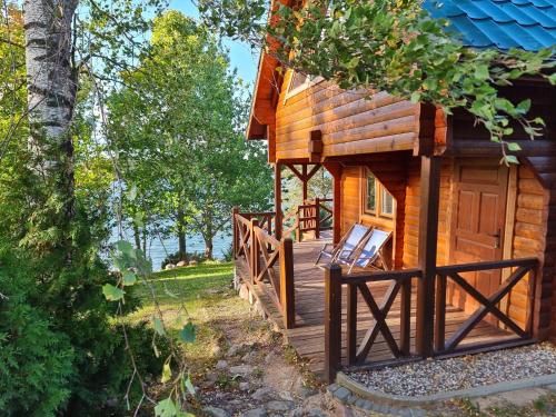 Domek Mazury Max nad jeziorem w Rynie in Ryn, Poland