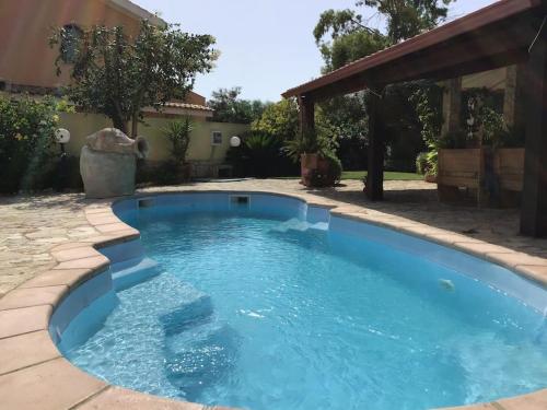 Apartment in Villa Beach 3 minutes walk spiaggia 3 minuti a piedi — 4-Star Luxury Hotel in Quartu Sant'elena, Italy