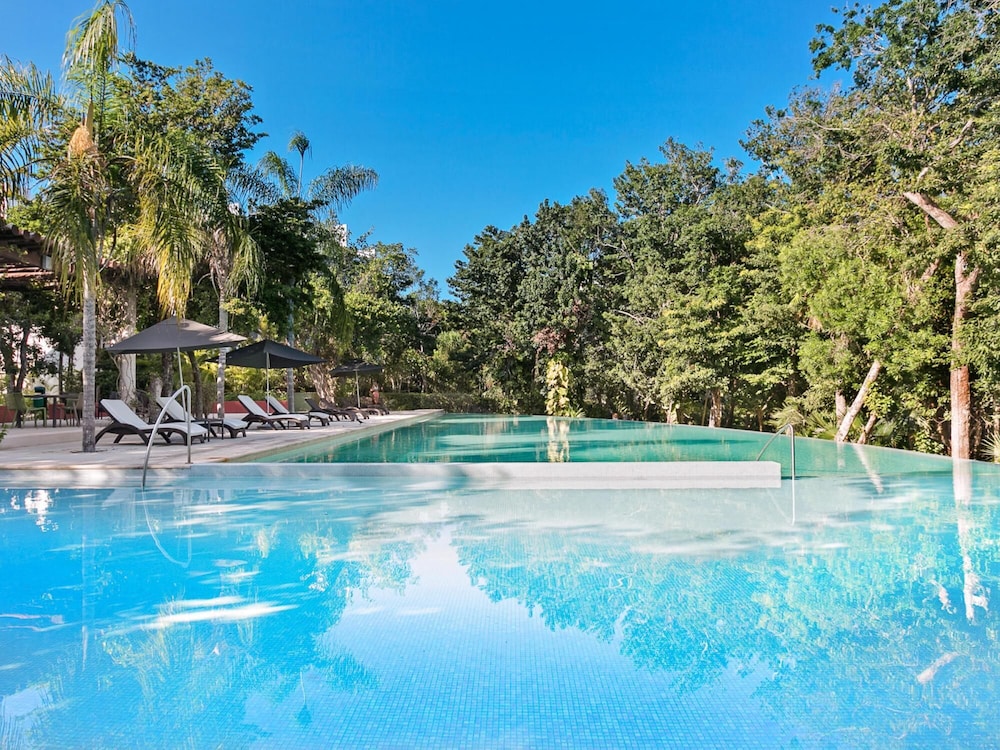 Luxury Condo in Paradise beaches Golf Wifi Resort Access Video Vir in Akumal, Mexico