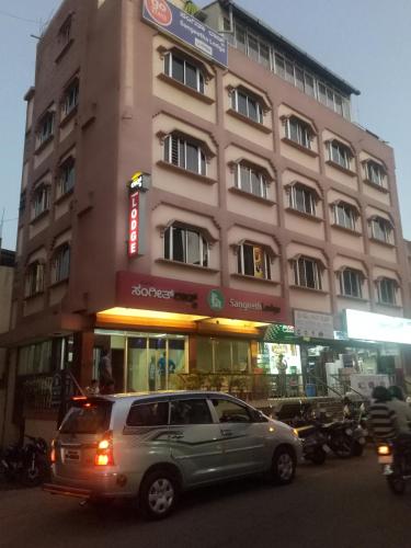 Hotel Sangeeth Lodging - carbon neutral hotel in Mysore