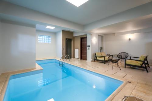 Indoor Pool Villa Near the Beach Lagonisi — 4-Star Luxury Hotel in Kalyvia Thorikou, Greece