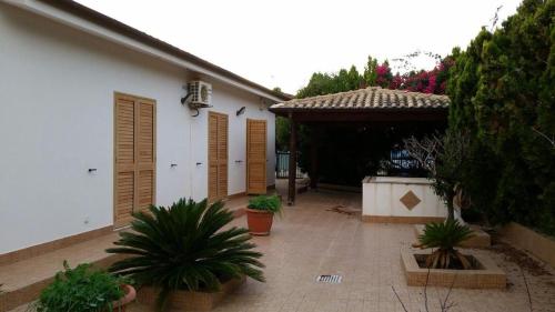 Townhouse in a quiet private residence — 4-Star Luxury Hotel in Porto Empedocle, Italy