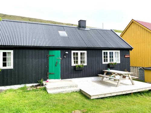 Charming old style shanty in Hvalba, Faroe Islands