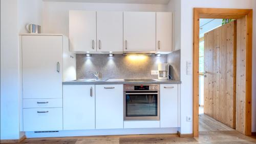Gästehaus Rass — 4-Star Luxury Hotel in Lofer, Austria