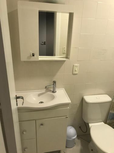 Apartamento á 30 metros praia com vista mar.