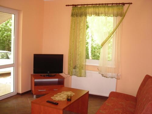 Domki W Zaciszu — hotel in Ostroda