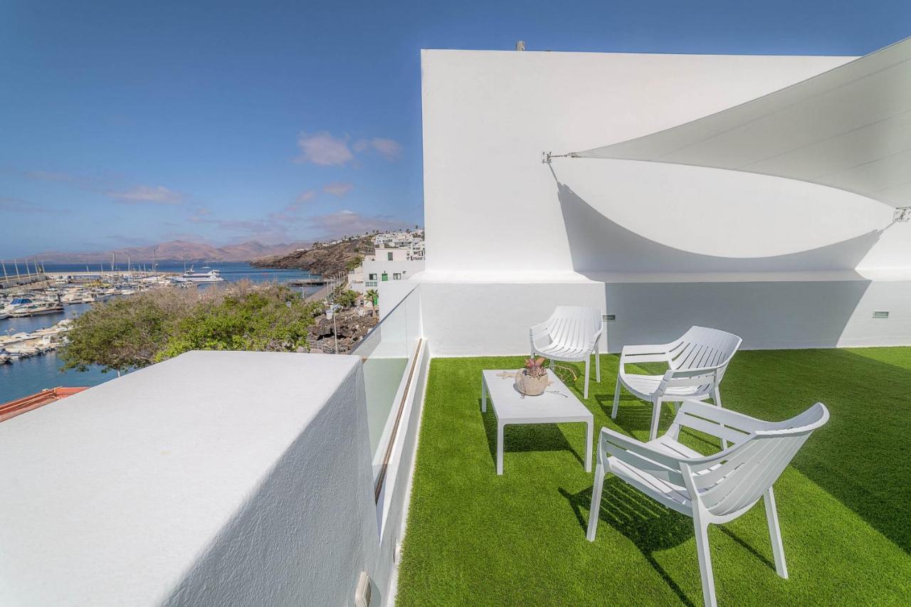 Vista Al Muelle by Hh in Puerto Del Carmen, Spain