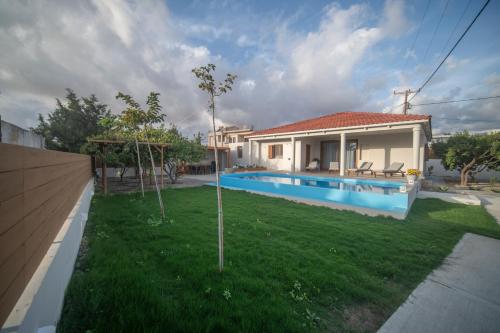 Avli Guest House — 4-Star Luxury Hotel in Tympaki, Greece