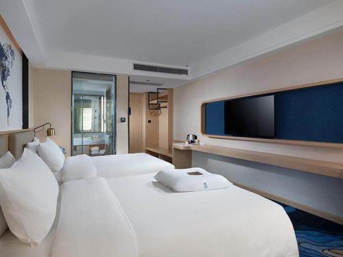 Kyriad Marvelous Hotel - carbon neutral hotel in Maoming