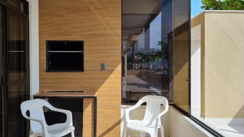 Apto pé na areia em Meia Praia Itapema 3 dormitórios
