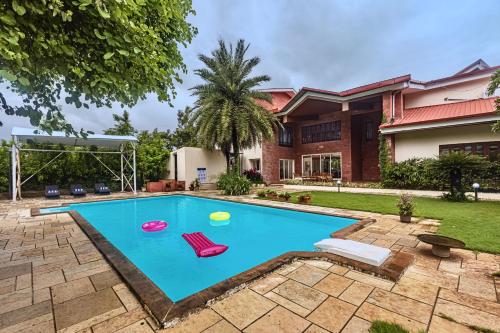 SaffronStays Ananya 4BR villa with pool minibar & game room near river Ullas in Karjat — 4-Star Luxury Hotel in Karjat, India