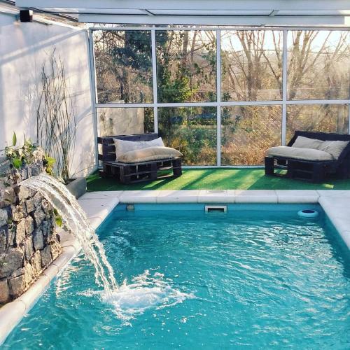 Altos del Pucara Piscina Climatizada vista a las sierras juegos infantiles in Villa Giardino, Argentina