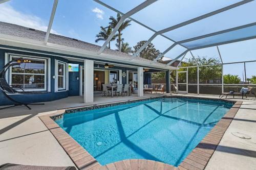 Sunny 4BR with Screened in Pool and Lanai in Cape Coral, United States