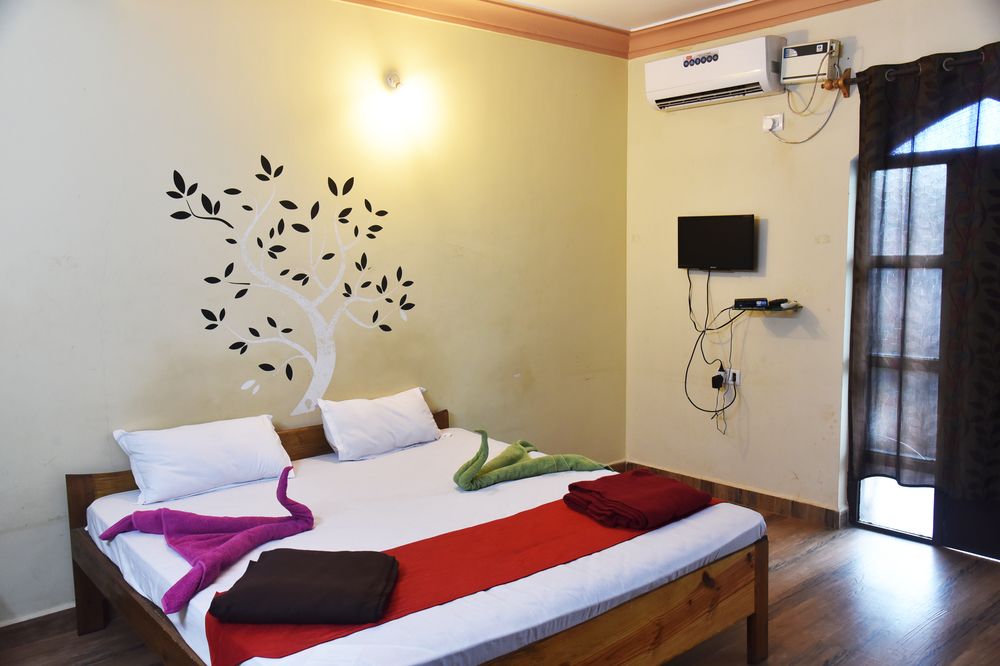 Smiley Baga Coast - carbon neutral hotel in Baga
