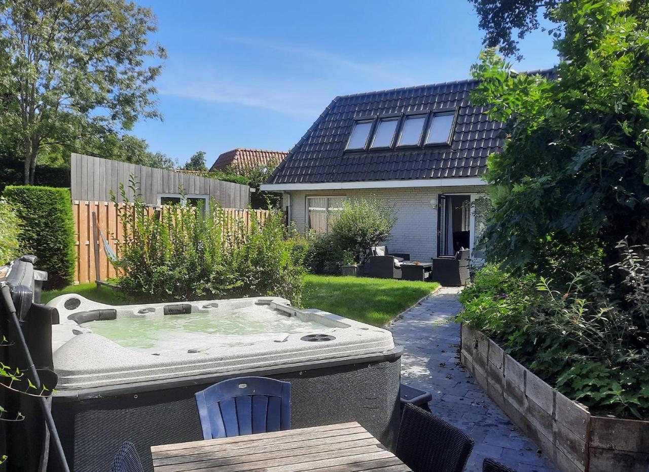 Have a nice stay Holiday Home de Witte Raaf with garden and hottub — 4-Star Luxury Hotel in Noordwijk-Binnen, Netherlands