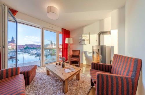 Müritzquartier No 13 Apartment in der Hafenresidenz mit Kamin & Hafenblick — 4-Star Luxury Hotel in Waren, Germany