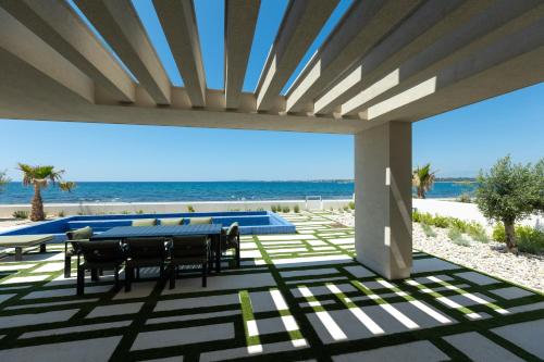 Adria Resort Pet Friendly SEAFRONT Villa C with private pool in Unknown City, Croatia