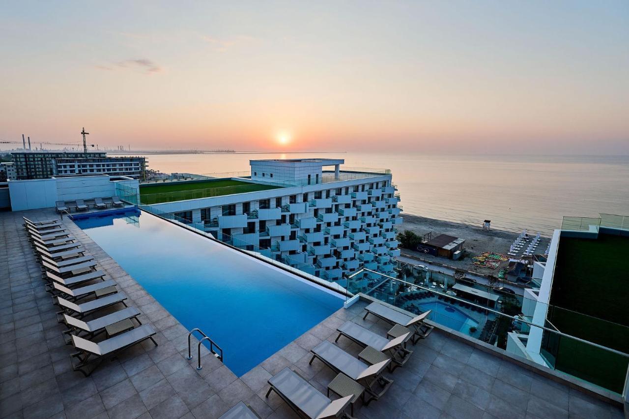 Seagull Apartment in Infinity Beach Resort parking - carbon neutral hotel in Unknown City