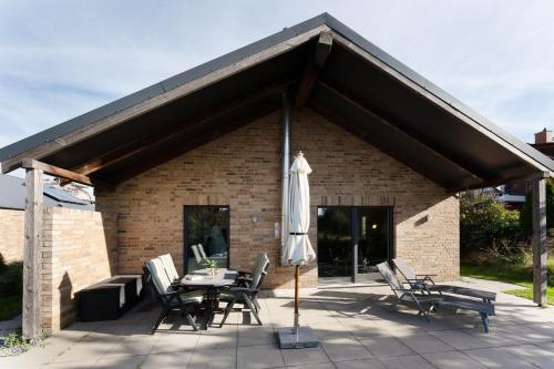 Sonnenstrahl & Wellengang Ferienhaus Wellengang in Kellenhusen, Germany