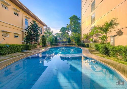 Palawan Romantic Studio with Balcony FREE Pool & Gym B2 5Chrysolite — 4-Star Luxury Hotel in Puerto Princesa, Philippines