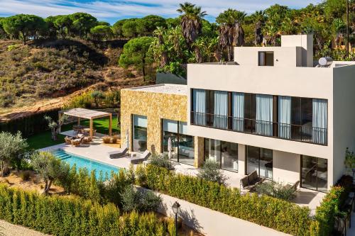 Luxury Villa In Quinta do Lago Private pool Rooftop Jacuzzi Office Game room ARKEO LUXURY — 4-Star Luxury Hotel in Almancil, Portugal