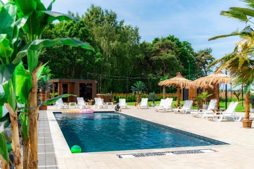 Domki Piaskowa11 Palm Resort & Wellness in Leba, Poland