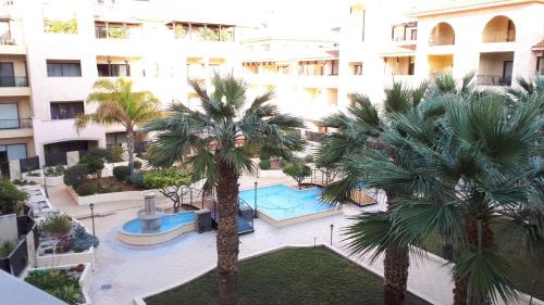 Seaside Modern Flat with Pool Queens Gardens 211 — 4-Star Luxury Hotel in Paphos, Cyprus