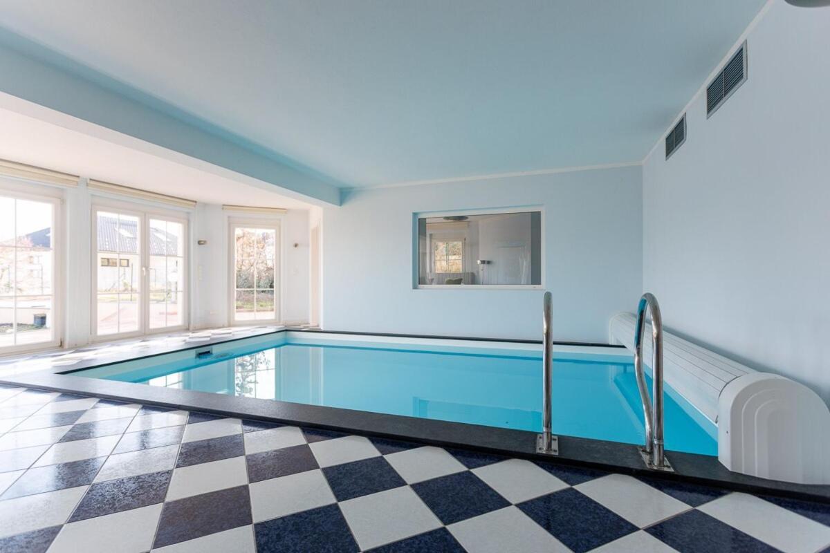 Luxury Villa with Indoor Pool Jacuzzi Sauna & Breathtaking City View — 4-Star Luxury Hotel in Klosterneuburg, Austria