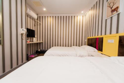 Weiyi Boutique Hotel — hotel in Caidian