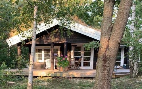 Log House Near A Child Friendly Sandy Beach — 4-Star Luxury Hotel in Nykobing Sjaelland, Denmark