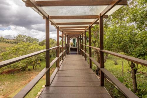 4 Suítes e Cozinha Lavras Novas - carbon neutral hotel in Unknown City