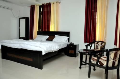 Fabhotel Surya Continental Kanpur Rd