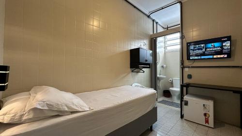 Suíte 12 Praia das Pitangueiras in Guaruja, Brasil