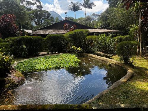 Sítio Pajuçara Chalé 1 Dentro do Parque Nacional da Serra dos Órgãos Acesso ao açúde e cachoeira dentro da propriedade in Guapimirim, Brasil