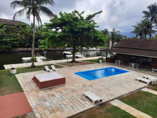Casa na Marina com piscina churrasqueira e píer — 4-Star Luxury Hotel in Guaruja, Brasil