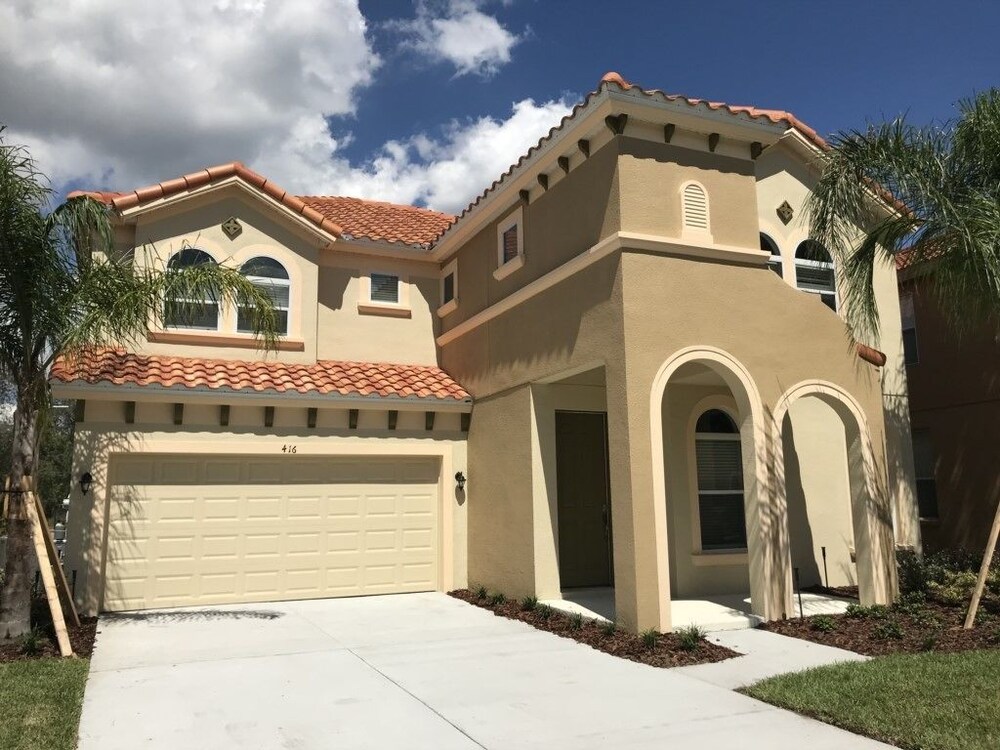 Well Appointed 6 Bed Pool Home at Watersong Resort - featured photo