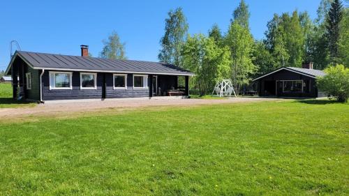 Rytkynranta Village - carbon neutral hotel in Unknown City