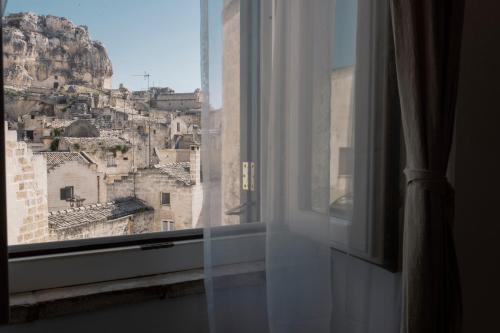 Il Vicinato casa vacanza immersa nel cuore dei Sassi — 4-Star Luxury Hotel in Matera, Italy