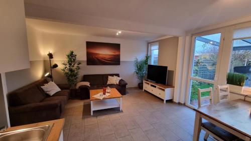 Ferienhaus Klippenbarsch — hotel in Dornum