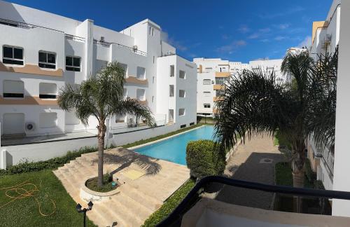 Achakkar Hills Seaside Family Apartment with Pool Beach Access AC Parking Play Area — 4-Star Luxury Hotel in Tangier, Morocco