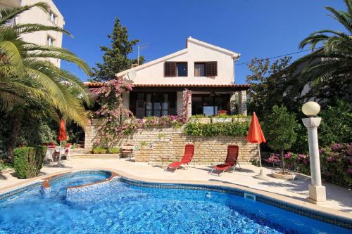 Seaside house with a swimming pool Seget Vranjica Trogir 4329 — 4-Star Luxury Hotel in Trogir, Croatia