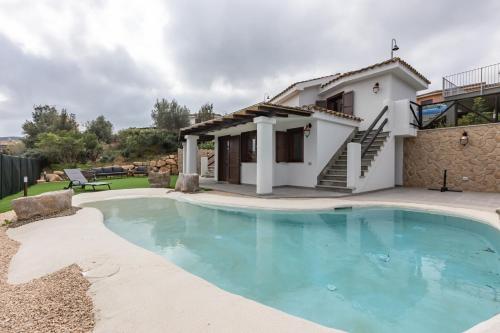 GuestHost Domus Ritae — 4-Star Luxury Hotel in Domus De Maria, Italy