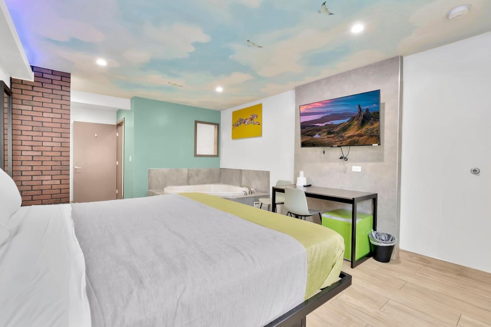 Exclusivo Inn & Suites - photo 11