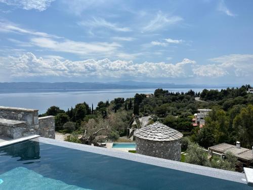 Windmills & The Villas Aiolos ll — 4-Star Luxury Hotel in Amarynthos, Greece