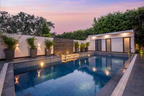 StayVista’s The Secret Lagoon with Outdoor Pool Verdant Lawn & Indoor Outdoor Activities in Ludhiana, India