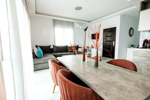 Design Suites Efharis — 4-Star Luxury Hotel in Nea Peramos, Greece