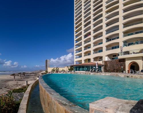 Apartment with Ocean View Pools & Sauna Las Olas — 4-Star Luxury Hotel in Rosarito, Mexico